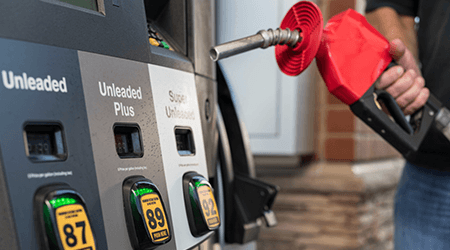 Person replacing gas dispenser